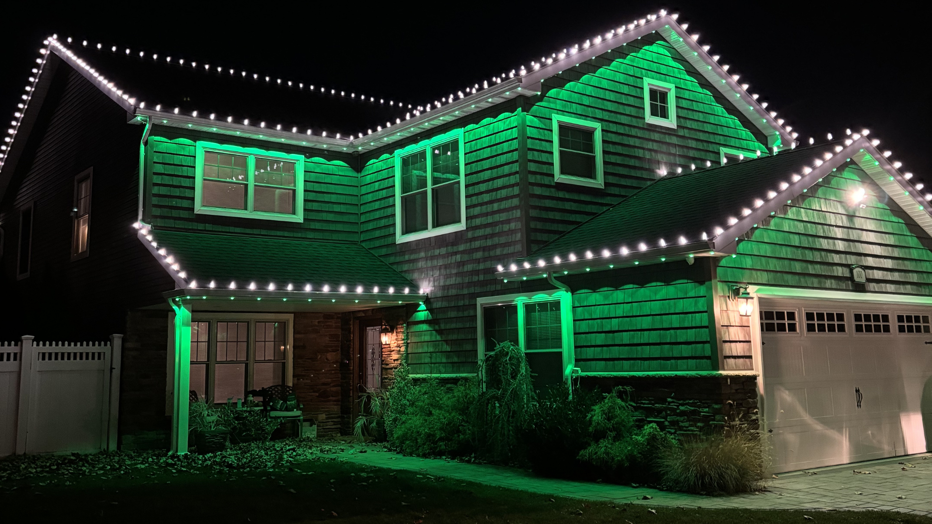 Beautifully decorated outdoor setting with permanent holiday lights