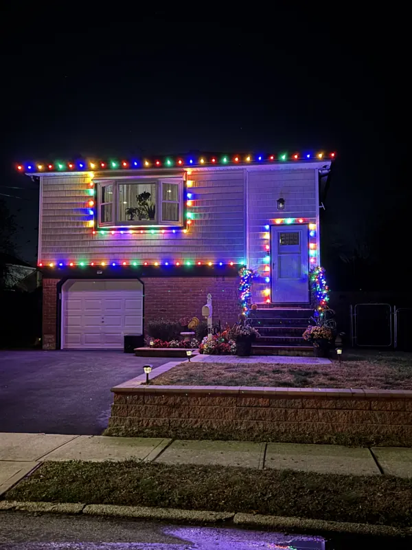Christmas light installation on Long Island by North Star: multicolor roofline, window and entry outlines