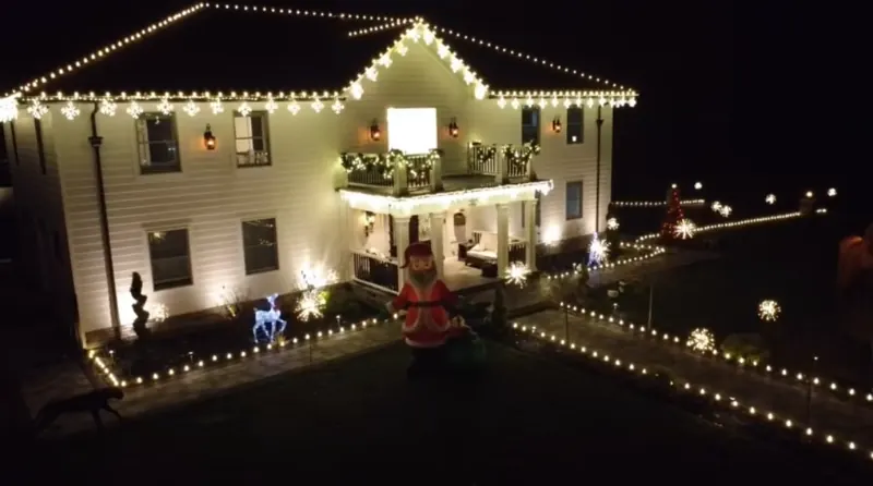 Christmas light installation on Long Island by North Star: warm white roofline and driveway lighting